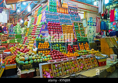 SHARM EL SHEIKH, EGYPT - DECEMBER 15, 2017: The appetizing showcase of the fruit store with many boxes of mango, oranges, pomegranates, lemons, on Dec Stock Photo