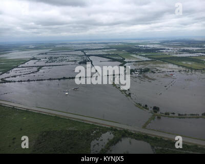 The view of the flooding devastation as seen from the vantage point of a CBP Air and Marine Operations UH-1n Huey Helicopter in the sky East of Houston.  August 30, 2017 Stock Photo
