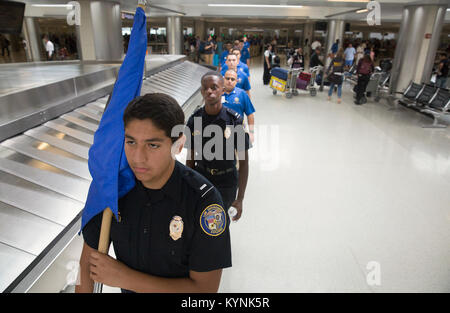 Explorers attending the National Law Enforcement Exploring Leadership Academy are given a tour of U.S. Customs and Border Protection, Office of Field Operations, activities at Dulles International Airport in Dulles, Va., July 25, 2017. U.S. Customs and Border Protection photo by Glenn Fawcett Stock Photo