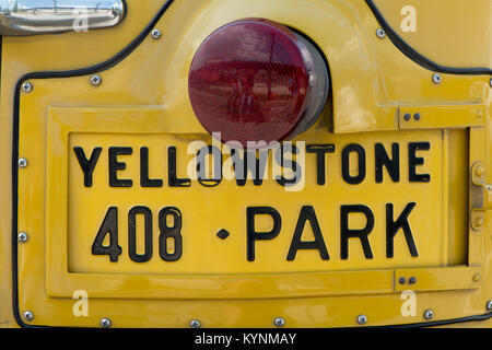 License number of a Yellowstone yellow bus Stock Photo