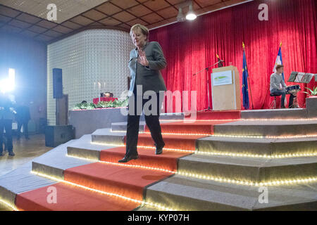 Trinwillershagen, Germany. 12th Jan, 2018. German Chancellor Angela Merkel (CDU) leaves the stage during the New Year's Reception of the state counsil of the district Vorpommern-Ruegen in Trinwillershagen, Germany, 12 January 2018. Merkel has been representing the electoral district Stralsund-Greifswald-Ruegen-Vorpommern since 1990 in the German Bundestag with a direct mandate. Credit: Stefan Sauer/dpa/Alamy Live News Stock Photo