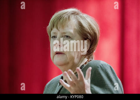 Trinwillershagen, Germany. 12th Jan, 2018. German Chancellor Angela Merkel (CDU) delivers a speech during the New Year's Reception of the state counsil of the district Vorpommern-Ruegen in Trinwillershagen, Germany, 12 January 2018. Merkel has been representing the electoral district Stralsund-Greifswald-Ruegen-Vorpommern since 1990 in the German Bundestag with a direct mandate. Credit: Stefan Sauer/dpa/Alamy Live News Stock Photo