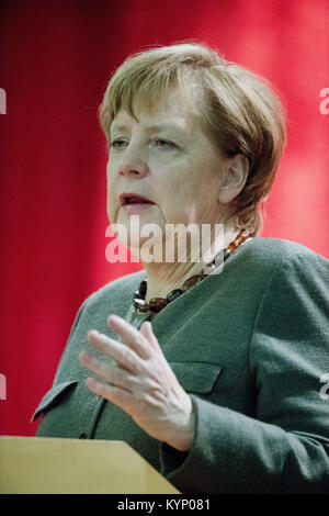 Trinwillershagen, Germany. 12th Jan, 2018. German Chancellor Angela Merkel (CDU) delivers a speech during the New Year's Reception of the state counsil of the district Vorpommern-Ruegen in Trinwillershagen, Germany, 12 January 2018. Merkel has been representing the electoral district Stralsund-Greifswald-Ruegen-Vorpommern since 1990 in the German Bundestag with a direct mandate. Credit: Stefan Sauer/dpa/Alamy Live News Stock Photo