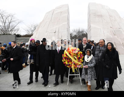 Washington, USA. 15th Jan, 2018. Martin Luther King Jr.'s son Martin Luther King III (2nd R, front), U.S. Secretary of Interior Ryan Zinke (4th R, front) and FBI Director Christopher Wray (5th L, front) walk to lay a wreath at Martin Luther King Jr. Memorial in Washington, DC, the United States, Jan. 15, 2018. Various activities are held on the third Monday of January each year throughout the United States to honor the civil rights leader Martin Luther King Jr., who was born on Jan. 15, 1929 and was assassinated in 1968. Credit: Yin Bogu/Xinhua/Alamy Live News Stock Photo