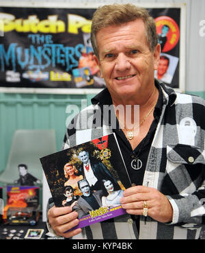 Deland, Florida, USA. 14th Jan, 2018. Former child actor Butch Patrick, best known for his role as Eddie Munster on the CBS comedy television series, The Munsters, which aired from 1964 to 1966, poses while holding a copy of his book, 'Munster Memories: A Coffin Table Book', during an appearance on January 14, 2018 at the annual Deland Comic and Collectibles show in Deland, Florida. Credit: Paul Hennessy/Alamy Live News Stock Photo