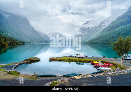 Family vacation travel RV, holiday trip in motorhome, Caravan car Vacation. Beautiful Nature Norway natural landscape. Stock Photo