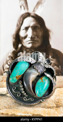 Antique Navajo silver and turquoise bear claw cuff. Stock Photo