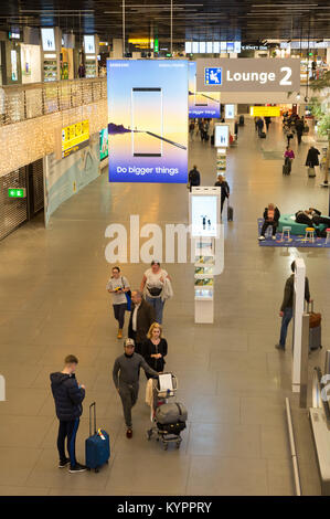 Passengers in the terminal, Amsterdam Airport Schiphol ( Schiphol airport ), Amsterdam, the Netherlands Europe Stock Photo