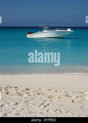 Speed boat out at sea at Shoal Bay beach in Anguilla Island Stock Photo