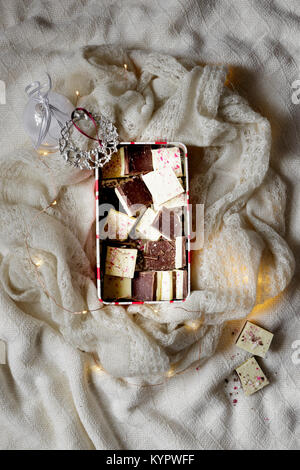 Peppermint Bark in a Christmas tin Stock Photo