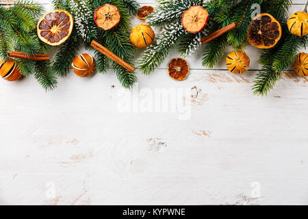 Flour New Year background. Christmas tree branches, gingerbread cookies,  spices and baking supplies on black wood background. Christmas, New Year  gree Stock Photo - Alamy