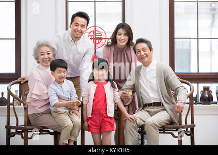 Happy family celebrating Chinese New Year Stock Photo