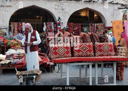 The streets of Doha can be colourful and full of life Stock Photo