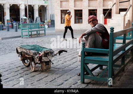 The streets of Doha can be colourful and full of life Stock Photo