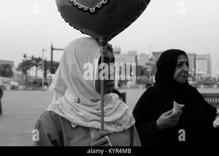 The streets of Doha can be colourful and full of life Stock Photo