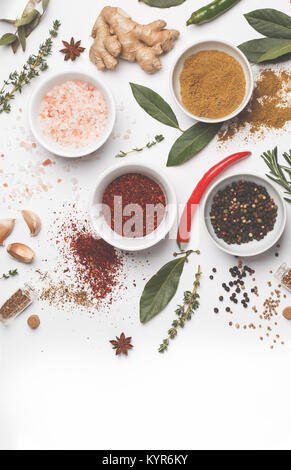 Selection of spices herbs and greens. White background, top view, copy space. Stock Photo