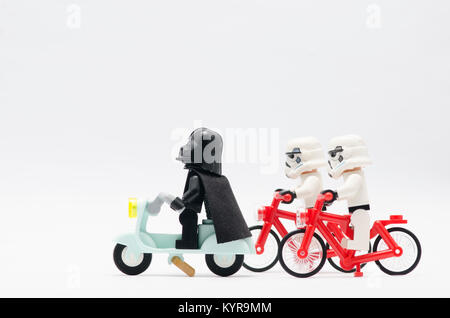 lego darth vader with storm trooper on patrol with scooter and bicycle. from star wars character. Stock Photo