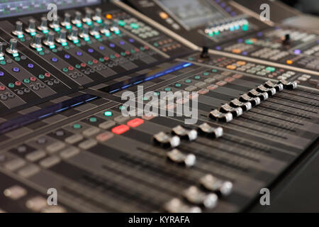 Close up view of digital audio mixing console. Selective focus. Stock Photo