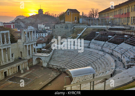 Remainings of Ancient Roman theatre of Philippopolis in Plovdiv at sunset, Aerial view of the roman amphitheater, Plovdiv, Bulgaria. Stock Photo