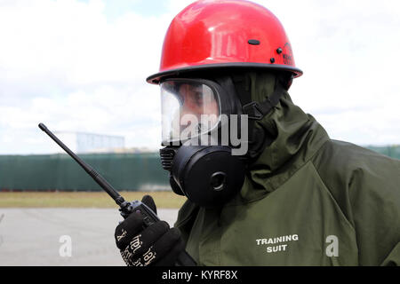 A Soldier assigned to the 414th Chemical Company from Orangeburg, South Carolina prepares to enter a simulated contamination area during a Joint Training Exercise hosted by the Homestead-Miami Speedway and Miami-Dade Fire Department in Miami, Florida. Jan. 11, 2018. This JTE focused on building response capabilities and the seamless transition between the local first responders and the follow-on support provided by the National Guard and Active duty soldiers. (U. S. Army Stock Photo