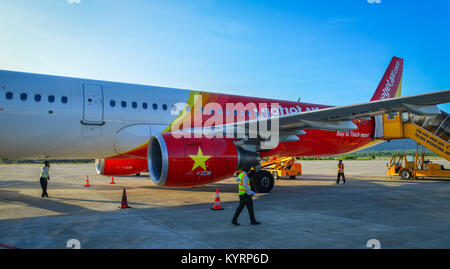 Phu Quoc, Vietnam - Dec 6, 2017. An aircraft docking at Phu Quoc International Airport. Phu Quoc is a Vietnam island off the coast of Cambodia in the  Stock Photo