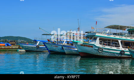 Phu Quoc, Vietnam - Dec 7, 2017. Tourist boats docking at pier in Phu Quoc, Vietnam. Phu Quoc is an island off the coast of Cambodia in the Gulf of Th Stock Photo