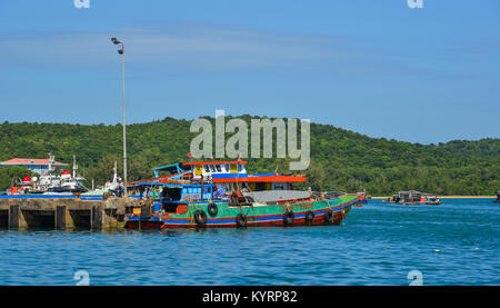 Phu Quoc, Vietnam - Dec 7, 2017. Wooden boats docking at jetty in Phu Quoc, Vietnam. Phu Quoc is an island off the coast of Cambodia in the Gulf of Th Stock Photo