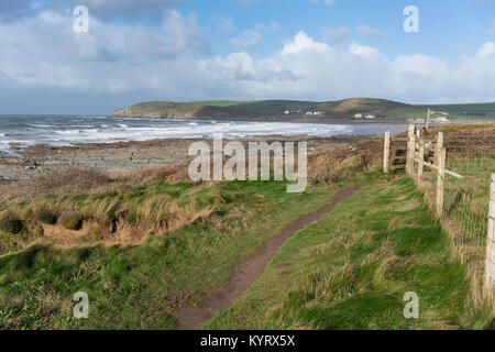 View across Croyde Bay in North Devon, looking towards Baggy Point, on a windy November day. Stock Photo