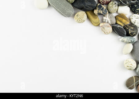 Frame of sea stones on a white background isolation Stock Photo