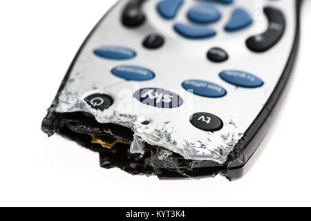 Sky remote control which has been chewed by a puppy dog. Stock Photo