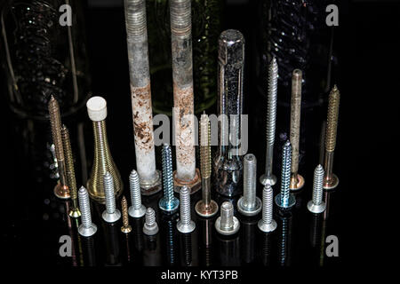 Upturned screws in pattern Stock Photo