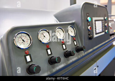 Analog manometers and control panel on industrial system Stock Photo