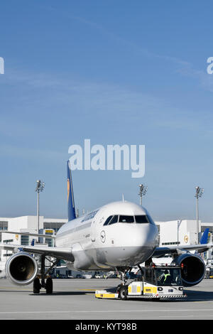 Lufthansa, A320-200, push, Push Back Truck, aircraft, airplane, plane, airlines, airways, roll, in, out,  Munich Airport, Stock Photo