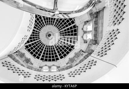 Detailed view of ceiling and spiral staircase at Tate Britain art gallery in London UK. Photographed in monochrome. Stock Photo