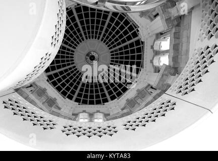 Detailed view of ceiling and spiral staircase at Tate Britain art gallery in London UK. Photographed in monochrome. Stock Photo