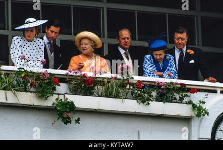 Derby Day at Epsom Race Course in 1986. Epsom Surrey England UK 1986 The Royal Family in the Royal Box. Prince Charles, Princess Diana, HM The Queen Mother,HRH Prince Philip, HM The Queen, Stock Photo