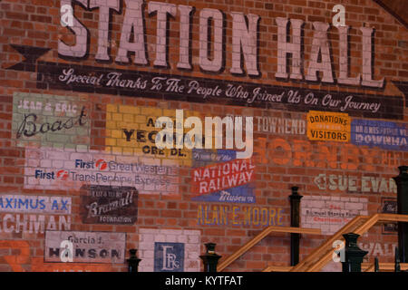 Painted advertising signs on a brick wall at National Railway Museum,York North Yorkshire,England,UK. Stock Photo