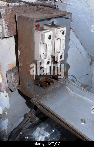 Old cast iron fuse box in cellar,UK, Stock Photo