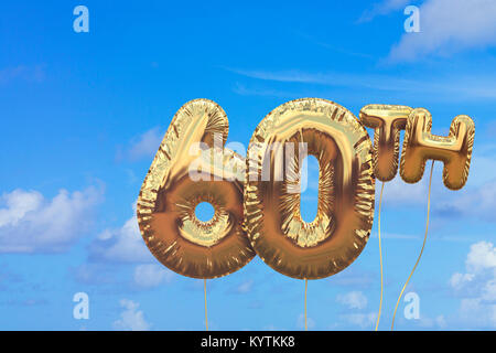 Gold number 60 foil birthday balloon against a bright blue summer sky. Golden party celebration. 3D Rendering Stock Photo