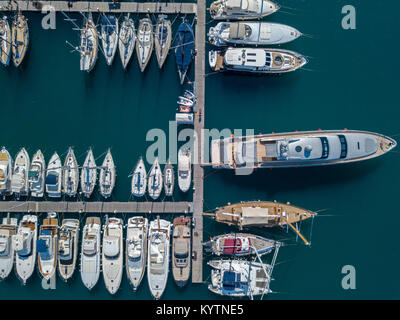 Aerial view of sailboats and moored boats. Boats moored in the port of Vibo Marina, quay, pier. Luxury yachts and sailing boats Stock Photo