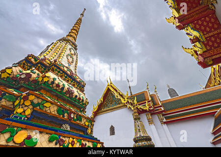 Low down angle of the Pagodas and buildings at Wat Pho Buddhist  temple, Bangkok, Thailand. Stock Photo