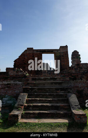 A spectacular view from Wat Mahathat with stones, pillars, walls and pavement which is ruined by aggressor in the past but still have an good conditio Stock Photo