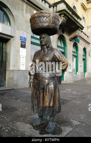Zagreb, Croatia. Dolac open-air market. Dolac is the largest and most colorful fruit and vegetable market in Zagreb. Statue of Kumica Barica, She is a symbol of people selling at this market. Name „Barica“ was chosen between other Zagreb county usual traditional female names. Stock Photo
