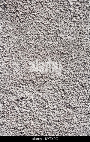 Rough rendered construction exterior full frame white painted wall texture background Stock Photo