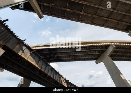 Elevated Highways and train tracks in Cincinnati Ohio. The two on the right are highways and the one on the bottom left is for trains. Stock Photo