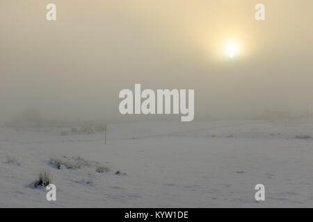 Wintry scene of snow mist and frost in the scottish highlands Stock Photo