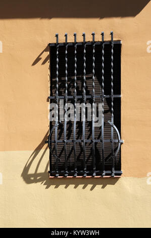 catalan architecture;wall with window and grill Stock Photo