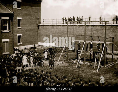 Washington, D.C. Hanging hooded bodies of the four conspirators; crowd departing Stock Photo