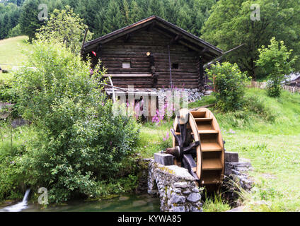 idyllic historic mountain village in high summer in the Swiss Alps Stock Photo