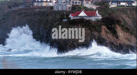 Newquay Storm  waves hit Newquay Famous island on towan Beach Newquay Cornwall UK Stock Photo